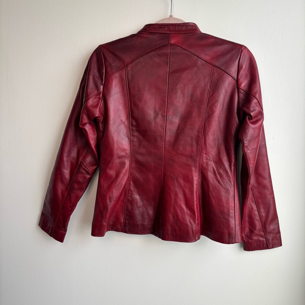 Chic Red Leather Jacket With Patterned Accents - image 4